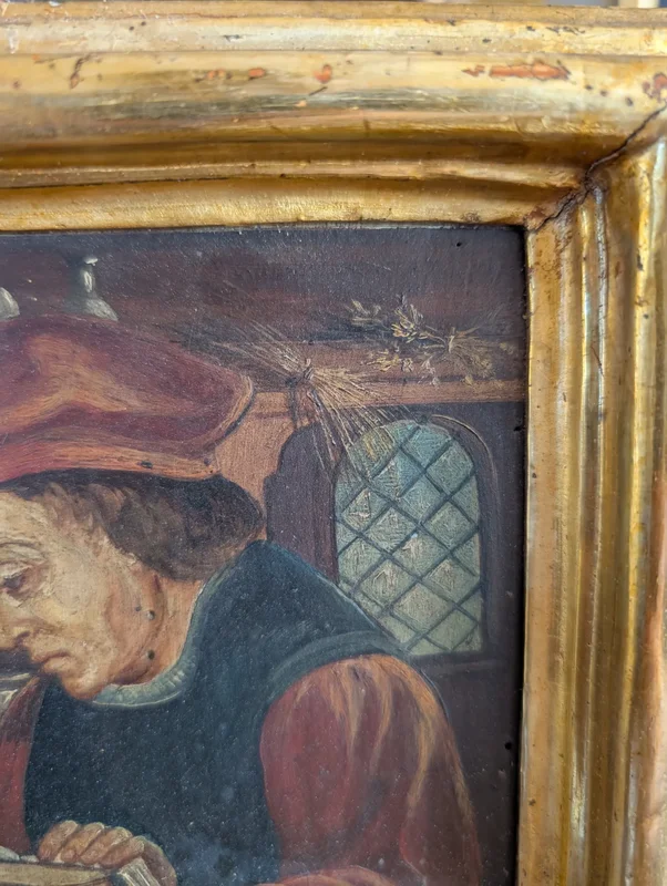 Panel painting depicting scholar in library, in gilt frame