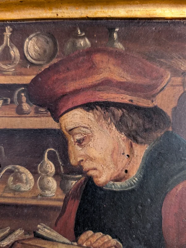 Panel painting depicting scholar in library, in gilt frame