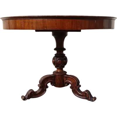 Table ronde en noyer de Bologne 1850