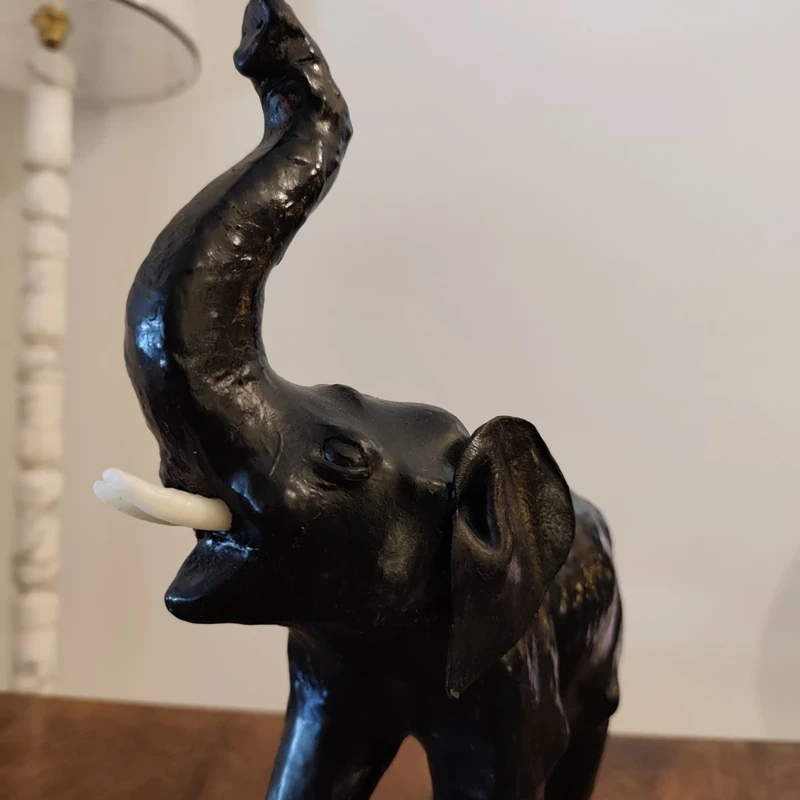 Elephant with tall trunk from the 1800s Papier machè