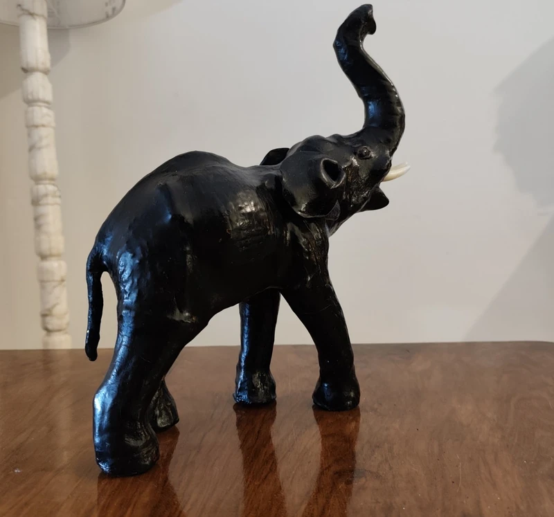 Elephant with tall trunk from the 1800s Papier machè
