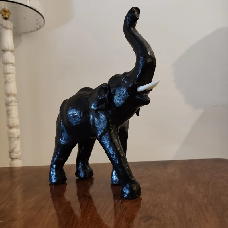 Elephant with tall trunk from the 1800s Papier machè