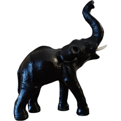 Elephant with tall trunk from the 1800s Papier machè
