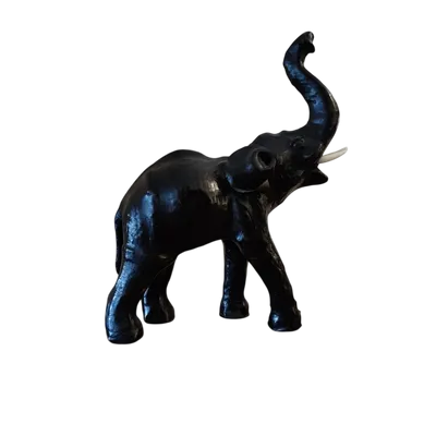 Elephant with tall trunk from the 1800s Papier machè