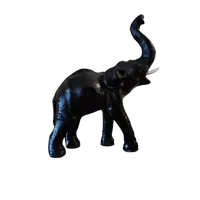 Elephant with tall trunk from the 1800s Papier machè