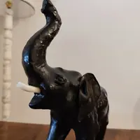 Elephant with tall trunk from the 1800s Papier machè