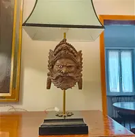Tre lampade da tavolo con maschere Balinesi in legno XIX secolo