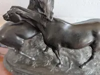 Sculpture en métal patiné représentant deux chevaux