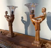 Paire de lampes 'Les Dames de Lumière' en bois 1910-1920