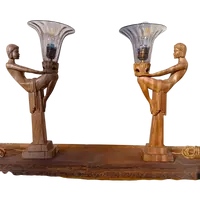 Paire de lampes 'Les Dames de Lumière' en bois 1910-1920