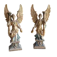 Pair of painted and gilded papier-mâché candleholder angels. Italian Baroque art 17th-18th cent.