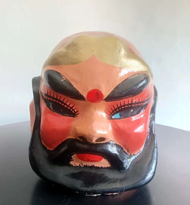 Triptych of Chinese masks from 1920 papier mache