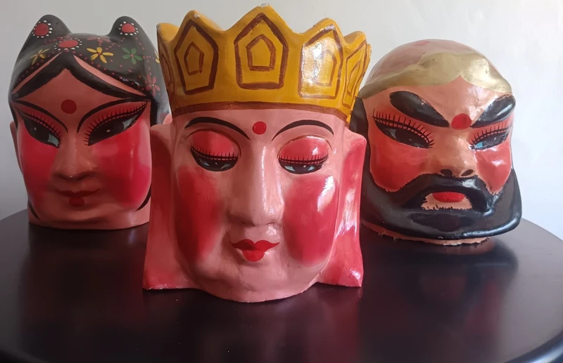 Triptych of Chinese masks from 1920 papier mache