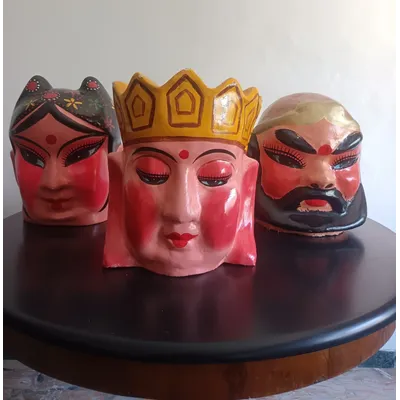 Triptych of Chinese masks from 1920 papier mache
