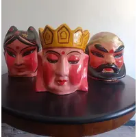Triptych of Chinese masks from 1920 papier mache