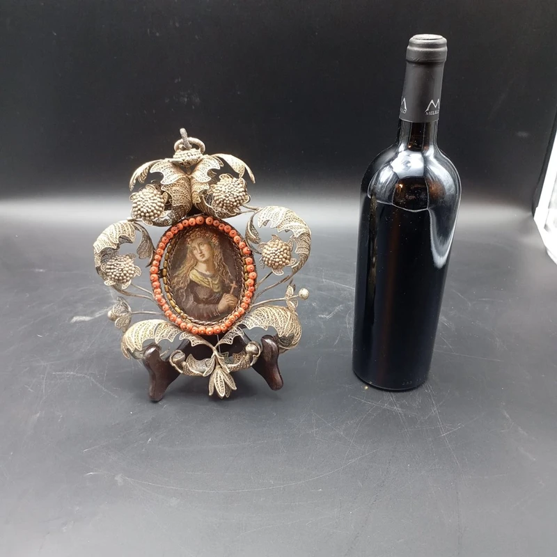 SILVER FILIGREE BEDSIDE TABLE WITH SMALL PAINTING DEPICTING SAINT ROSALIE