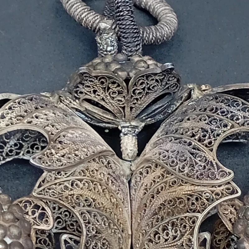 SILVER FILIGREE BEDSIDE TABLE WITH SMALL PAINTING DEPICTING SAINT ROSALIE