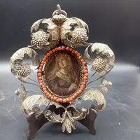 SILVER FILIGREE BEDSIDE TABLE WITH SMALL PAINTING DEPICTING SAINT ROSALIE