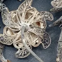 SILVER FILIGREE BEDSIDE TABLE WITH SMALL PAINTING DEPICTING SAINT ROSALIE