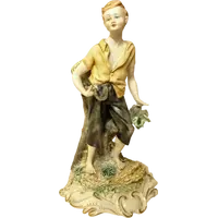 Figurine en céramique peinte à la main de Capodimonte signée Volta
