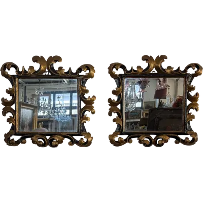 Pair of Tuscan mirrors in gilt and ebonized wood, 18th century