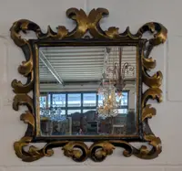 Pair of Tuscan mirrors in gilt and ebonized wood, 18th century
