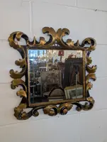Pair of Tuscan mirrors in gilt and ebonized wood, 18th century