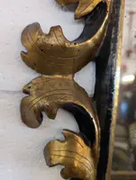 Pair of Tuscan mirrors in gilt and ebonized wood, 18th century