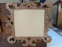 Pair of Tuscan mirrors in gilt and ebonized wood, 18th century