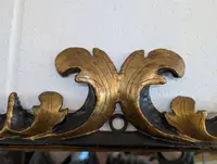 Pair of Tuscan mirrors in gilt and ebonized wood, 18th century