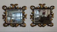 Pair of Tuscan mirrors in gilt and ebonized wood, 18th century