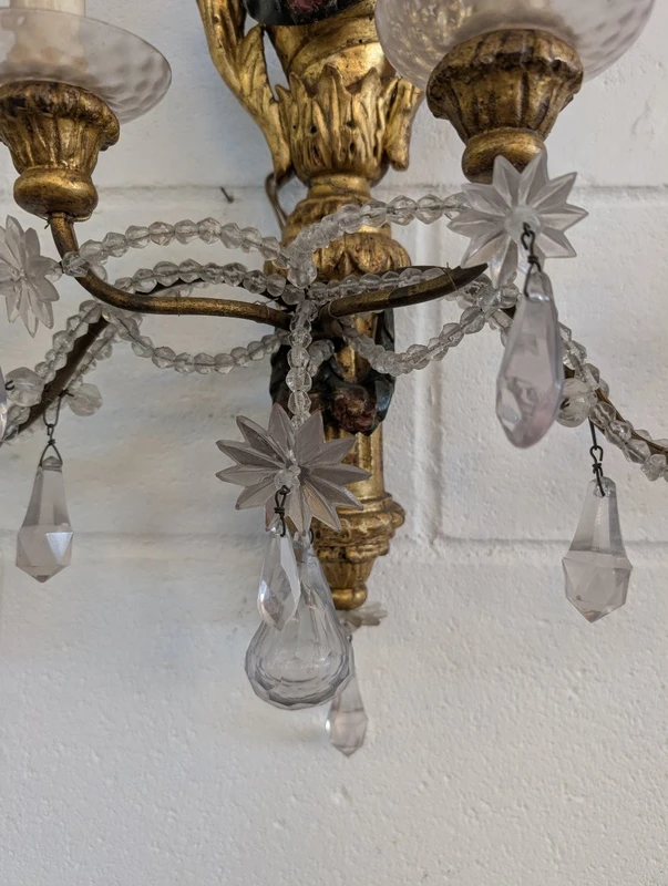 Pair of Genoese gilded and lacquered wood wall sconces, crystals, late 19th century