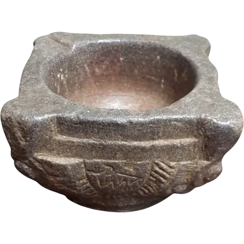 Antique carved stone mortar