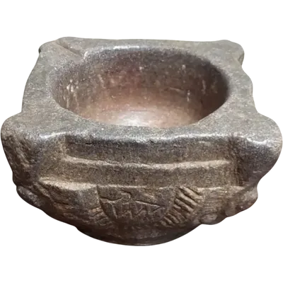 Antique carved stone mortar