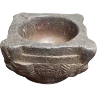 Antique carved stone mortar