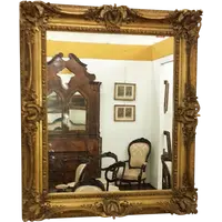 Miroir en plâtre doré restauré