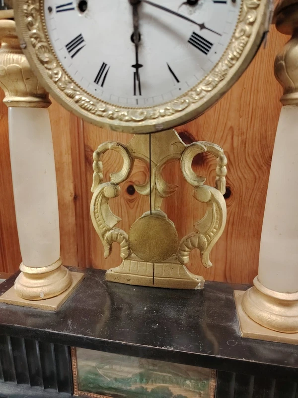Bidermaier temple clock in ebonized wood and gilt alabaster columns 19th century