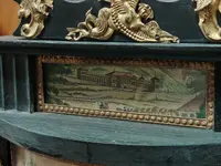 Bidermaier temple clock in ebonized wood and gilt alabaster columns 19th century
