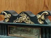 Bidermaier temple clock in ebonized wood and gilt alabaster columns 19th century