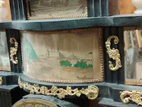 Bidermaier temple clock in ebonized wood and gilt alabaster columns 19th century