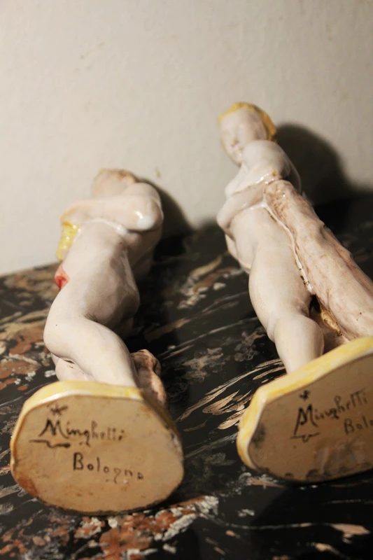 Manifattura MInghetti Bologna| Coppia di figure mitologiche in ceramica policroma.
