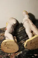Manifattura MInghetti Bologna| Coppia di figure mitologiche in ceramica policroma.