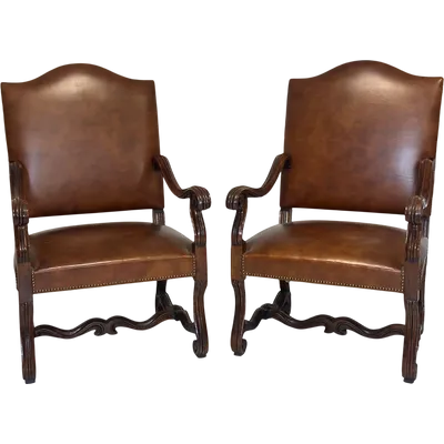 Pair of Louis XIV walnut and leather seats. Restored