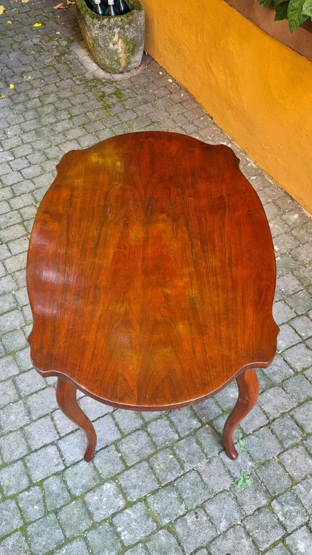 Moved antique walnut panelled writing table