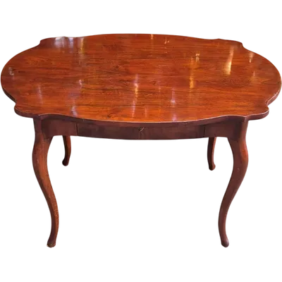 Moved antique walnut panelled writing table