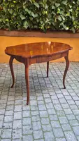 Moved antique walnut panelled writing table