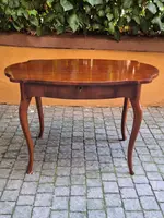 Moved antique walnut panelled writing table