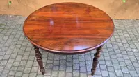 Extendable antique round walnut table from the 1800s