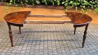 Extendable antique round walnut table from the 1800s