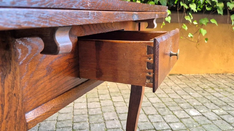 Antique extendable pull-out table moved legs